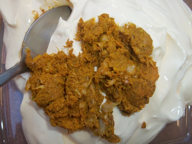 Adding spices and garlic to mayonnaise