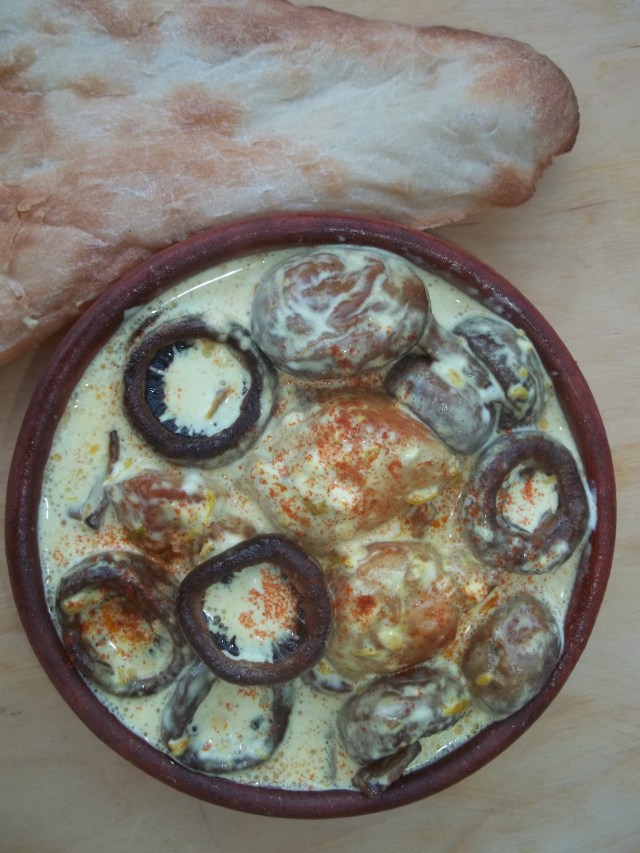 Chicken with mushrooms and mayonnaise ready for serving